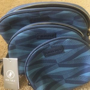 Manaola Half Moon Clutch